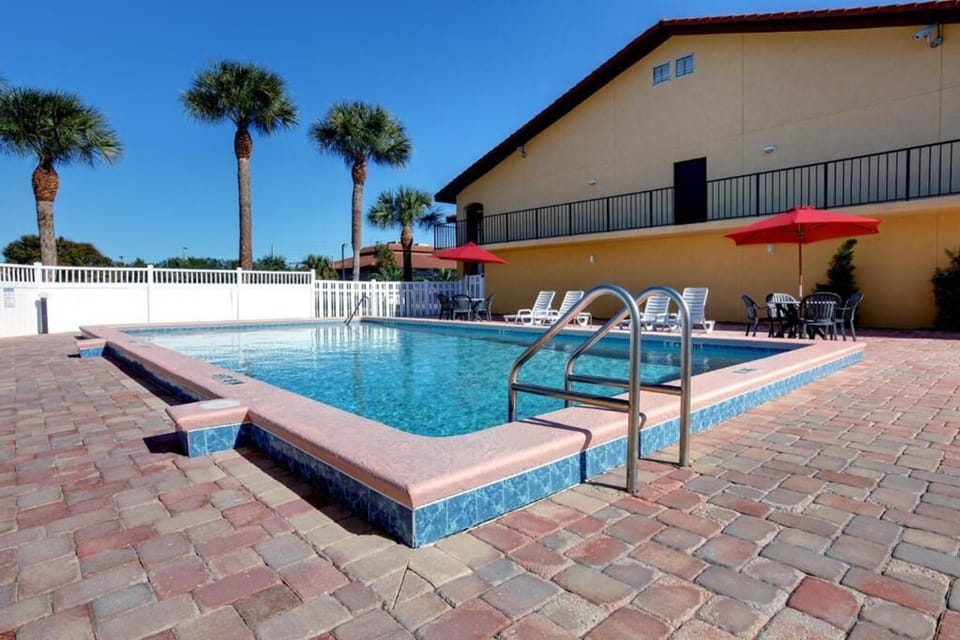 Dive into sparkling water and unwind on shaded loungers.