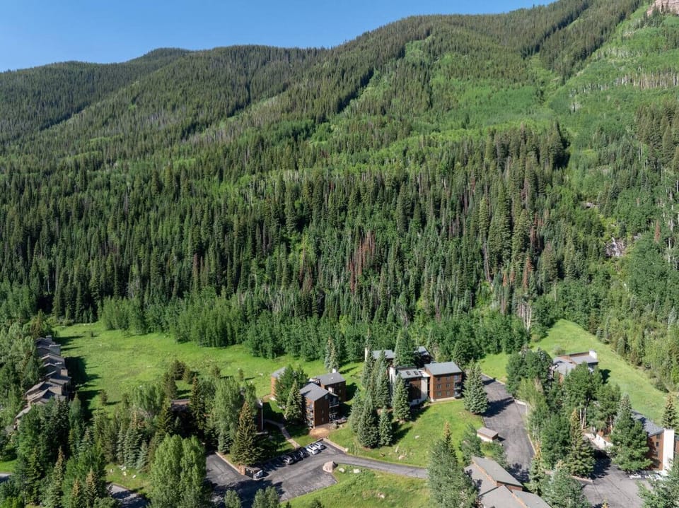 Aerial view of Timber Falls nestled against the gorgeous mountains