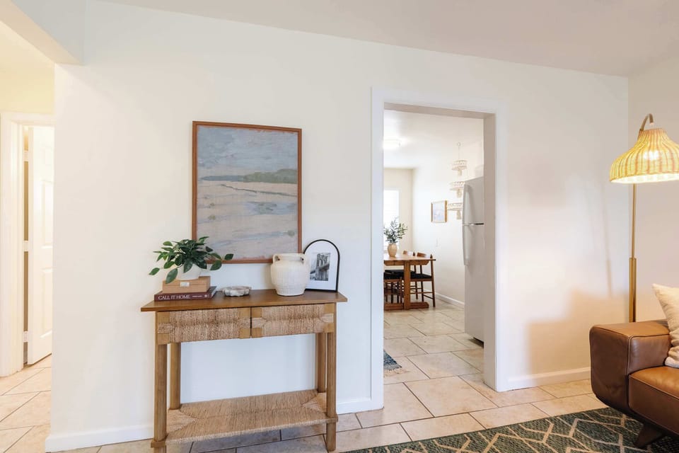 Entryway and hallway leading into your bright coastal retreat