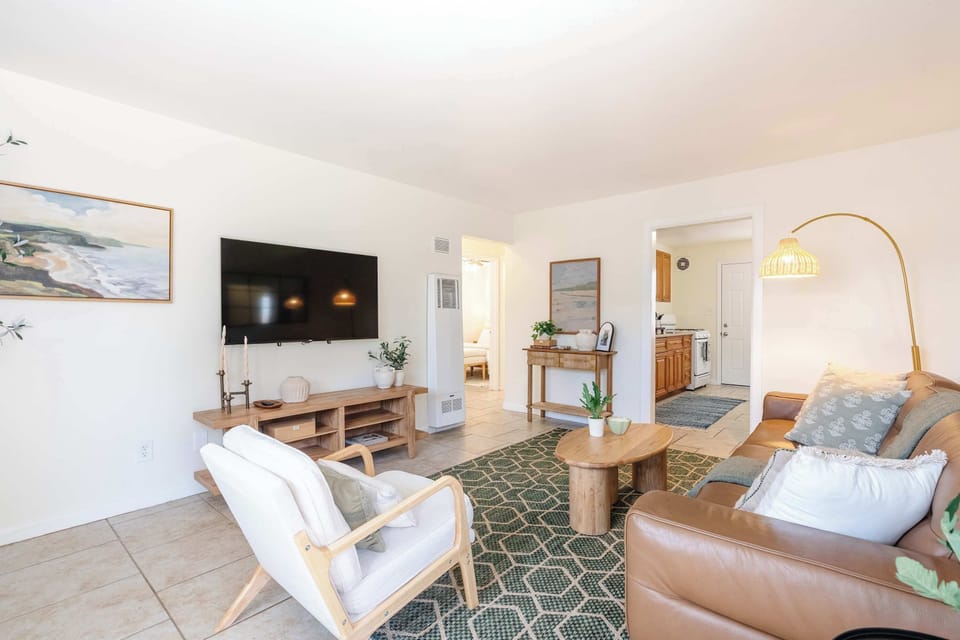 Relaxing lounge area with plenty of seating and smart TV