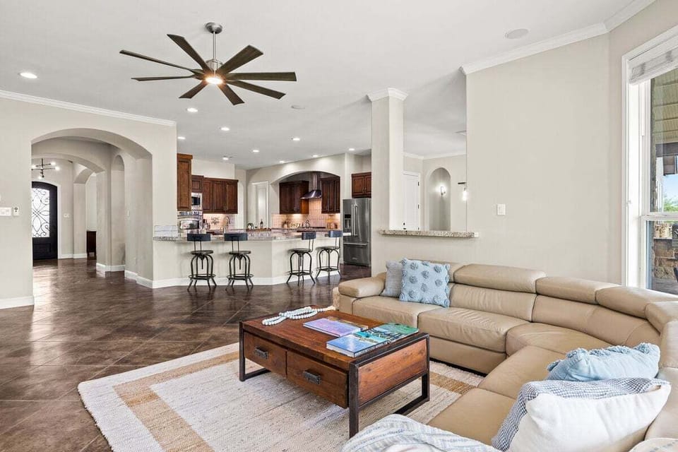 Settle into the comfort of our plush leather sectional sofas and cozy up by the inviting fireplace, creating a warm and inviting atmosphere