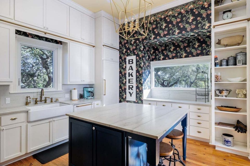 Prepare culinary delights in our modern kitchen, equipped with stainless steel appliances and ample counter space