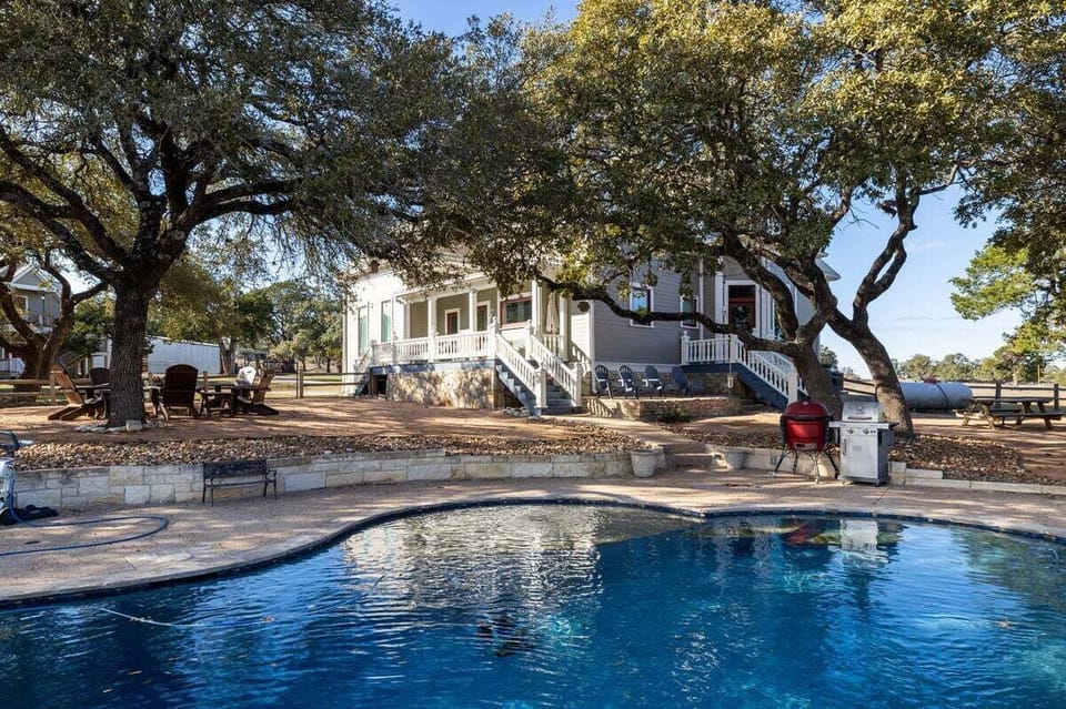 Take in the breathtaking vistas of our secluded ranch, showcasing the elegant architecture of our Victorian home against the backdrop of the Texas Hill Country