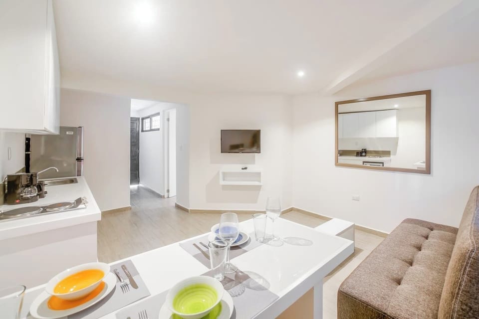 Living room, kitchen and dining area with air conditioner