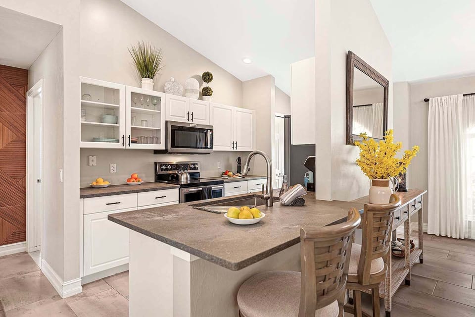 Kitchen with Bar and View of the Main Living Space