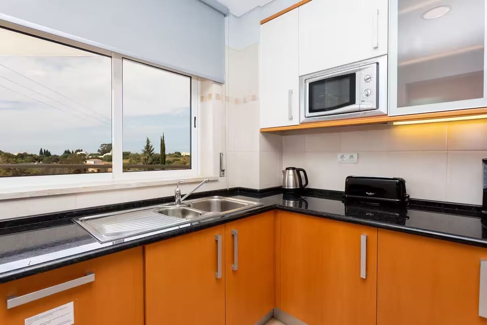 Whip up easy meals in the bright, view-filled kitchen.
