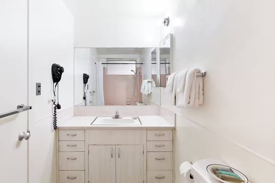 Get ready with generous counter space and clear lighting.
