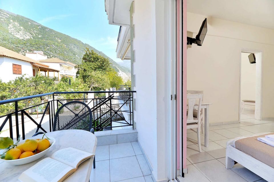 A balcony with a mountain view