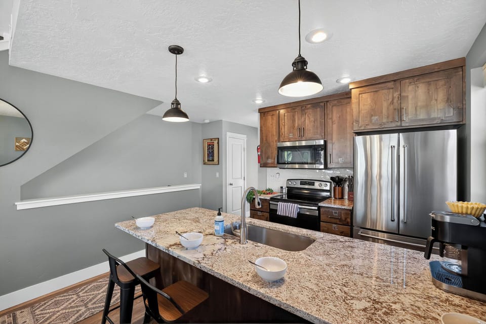 The kitchen island and counters give plenty of prep space for big group meals and snack spreads.