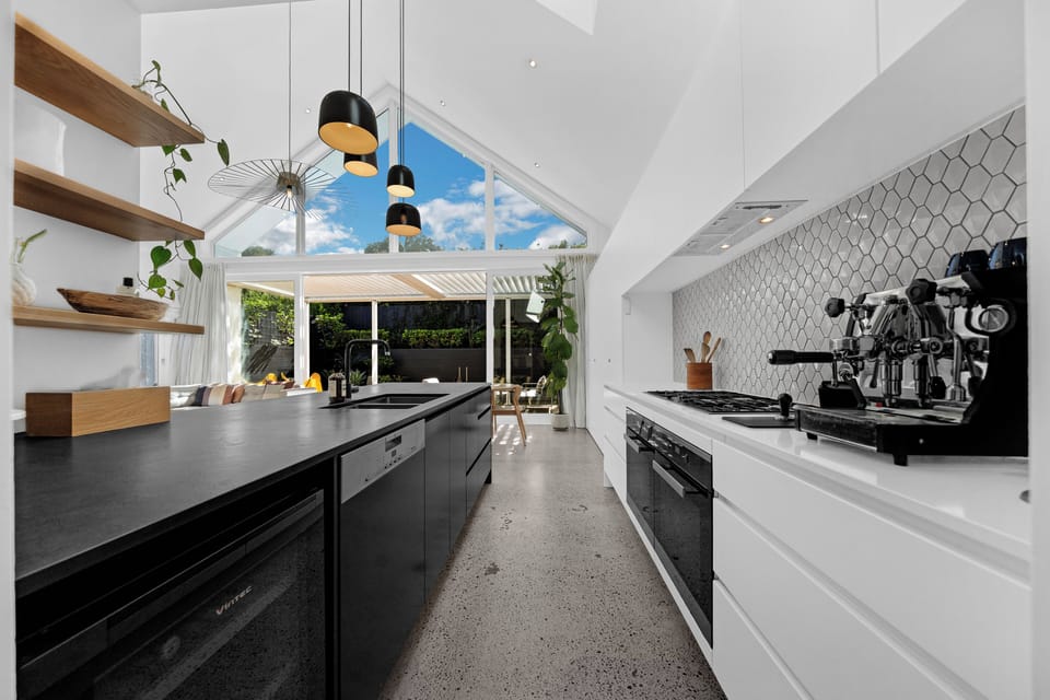 Kitchen with island & garden outlook