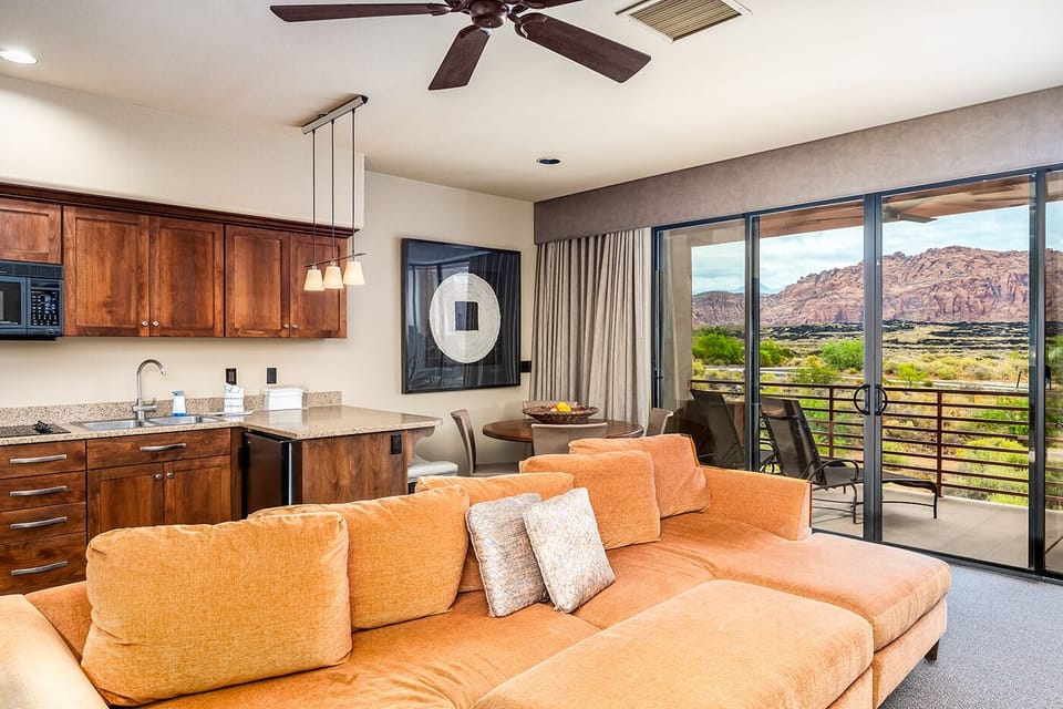 Gather on the plush sectional with sweeping red-rock vistas.