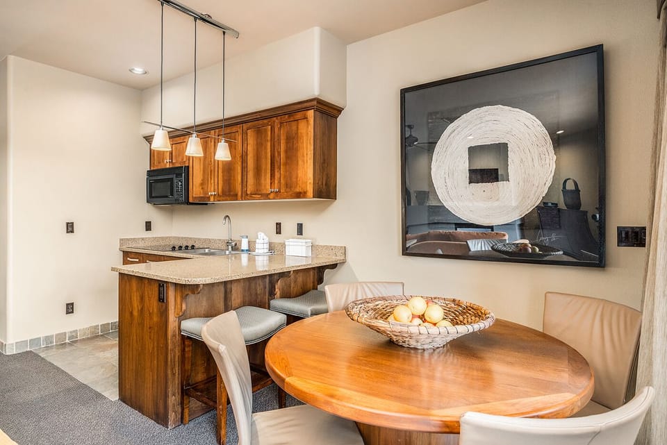 Savor a relaxed breakfast at the cozy in-suite table.