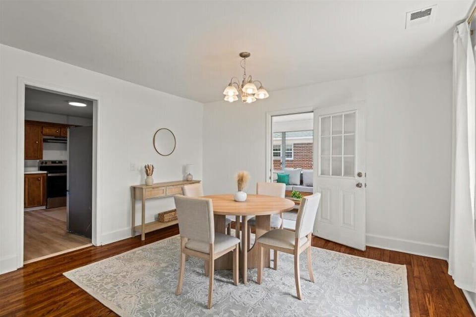 Dining area with door to sunroom