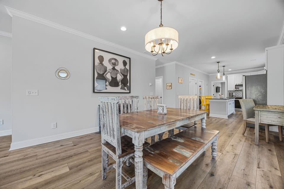 Spacious dining area ideal for family meals, game nights, and gathering with friends after a day exploring Carolina Beach.
