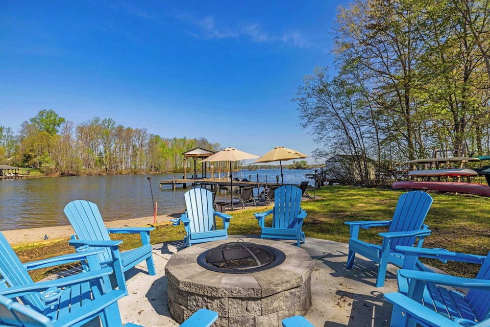 The Beach Escape: Lounge chairs and an umbrella right on the water's edge.