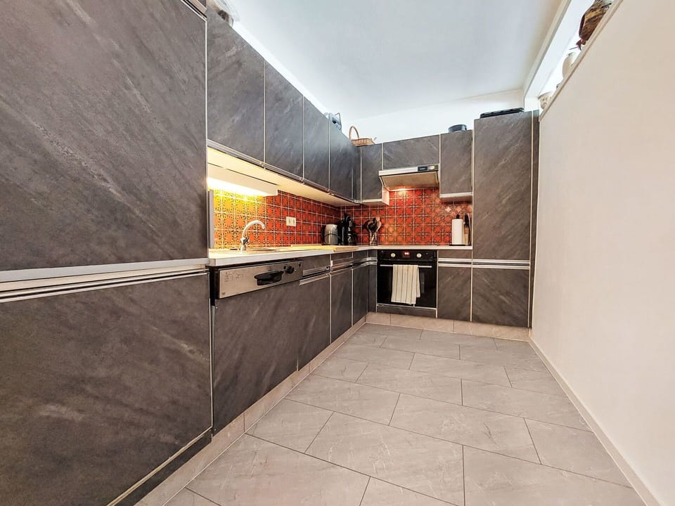 Flooring, Wood, Kitchen, Floor, Countertop, Major Appliance, Kitchen Appliance, Composite Material, Ceiling, Tile