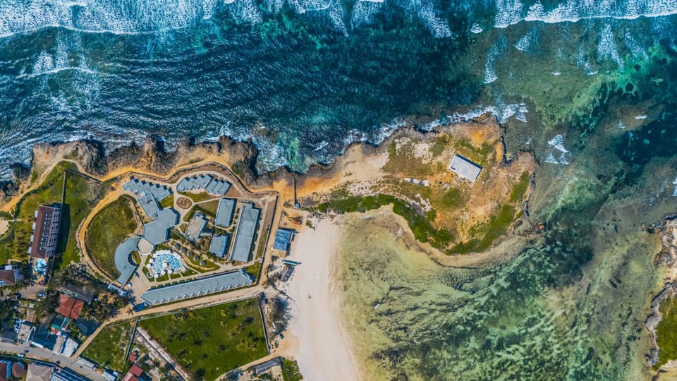 Marvel at turquoise waters and reef patterns from a birds-eye view.