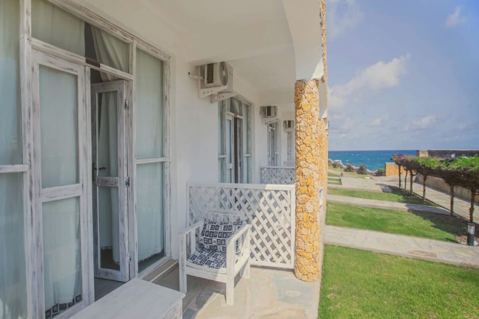 Breathe salty air from your shaded seat with ocean glimpses.