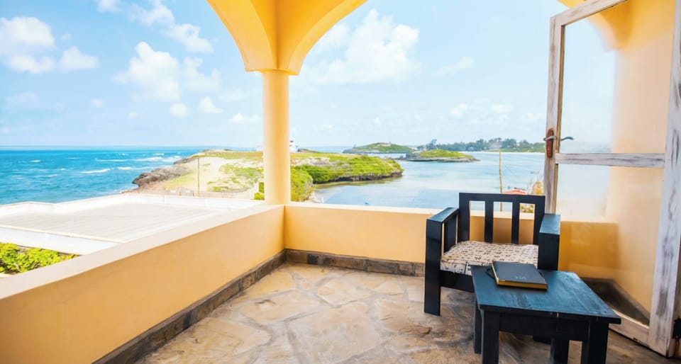 Unwind on the balcony with endless ocean views and breezes.