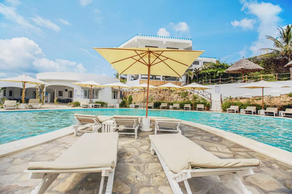Stretch out poolside and savor laid-back resort lounging