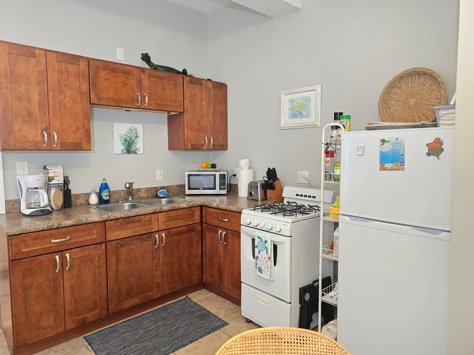 Enjoy a fully equipped kitchen, stocked with everything you need for preparing meals at home