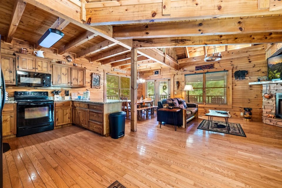 Designed for connection, this open-concept gathering space keeps everyone close whether you`re cooking, relaxing by the fire, or sharing stories from the day`s adventures.