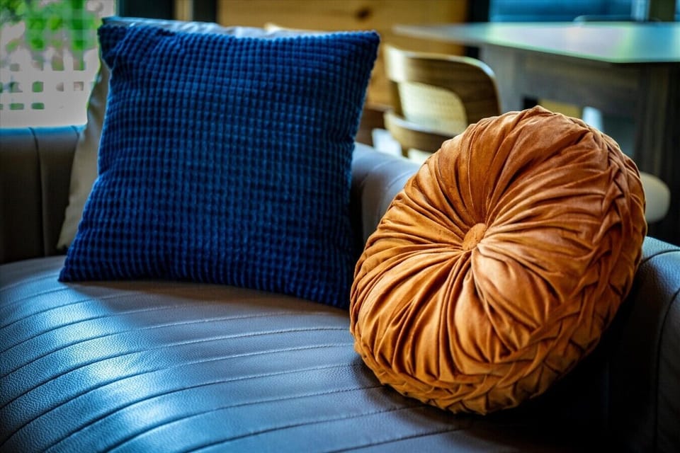 Thoughtful décor, comfortable seating, and warm cabin accents create an inviting space for relaxing after a day in the Smokies.