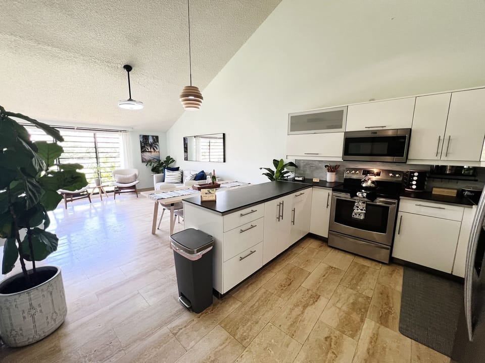 Open, bright and stylish kitchen with dining area