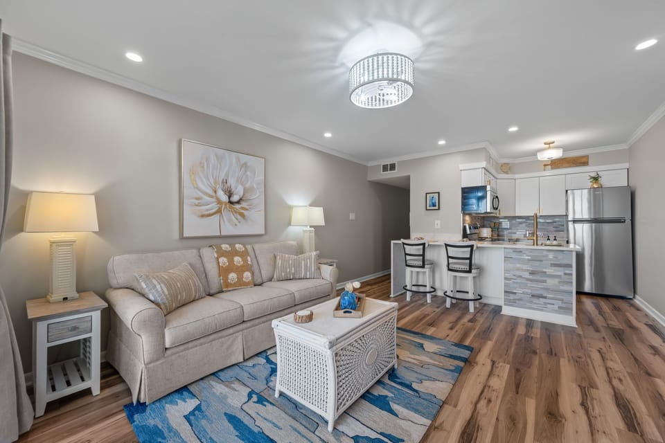 Open layout connecting living, dining, and kitchen for easy, laid-back stays