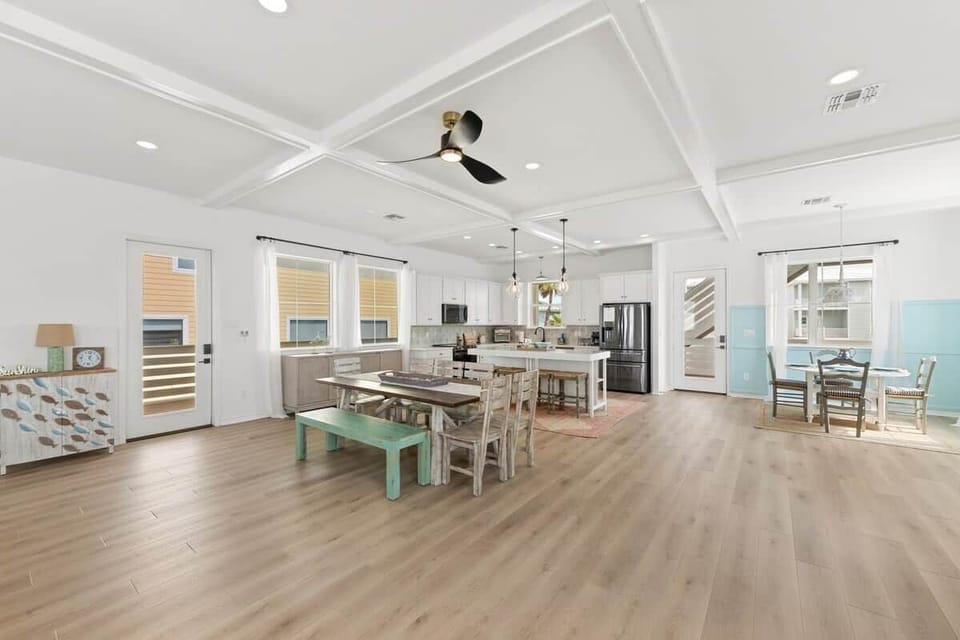 Large open dining space with comfortable seating for 9 at the table, 4 at the island and 4 at the breakfast nook. 