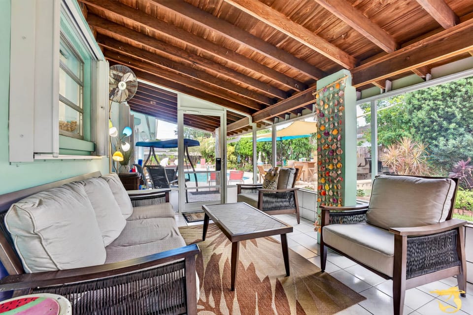 Screened in patio comfortably seats 12