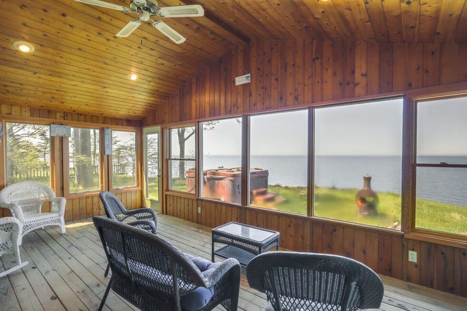Sunroom | Panoramic Lake Views & Natural Light