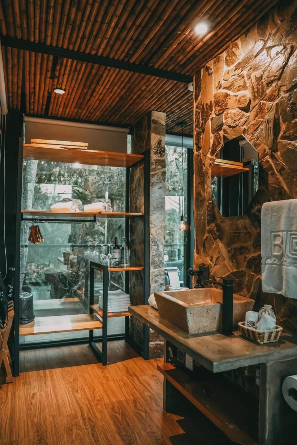 Refresh in a spa-like shower framed by natural stone.