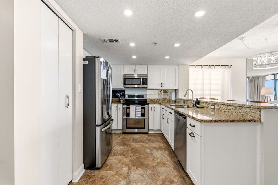 Fully equipped kitchen with everything you need to cook meals and enjoy a true home-away-from-home experience.
