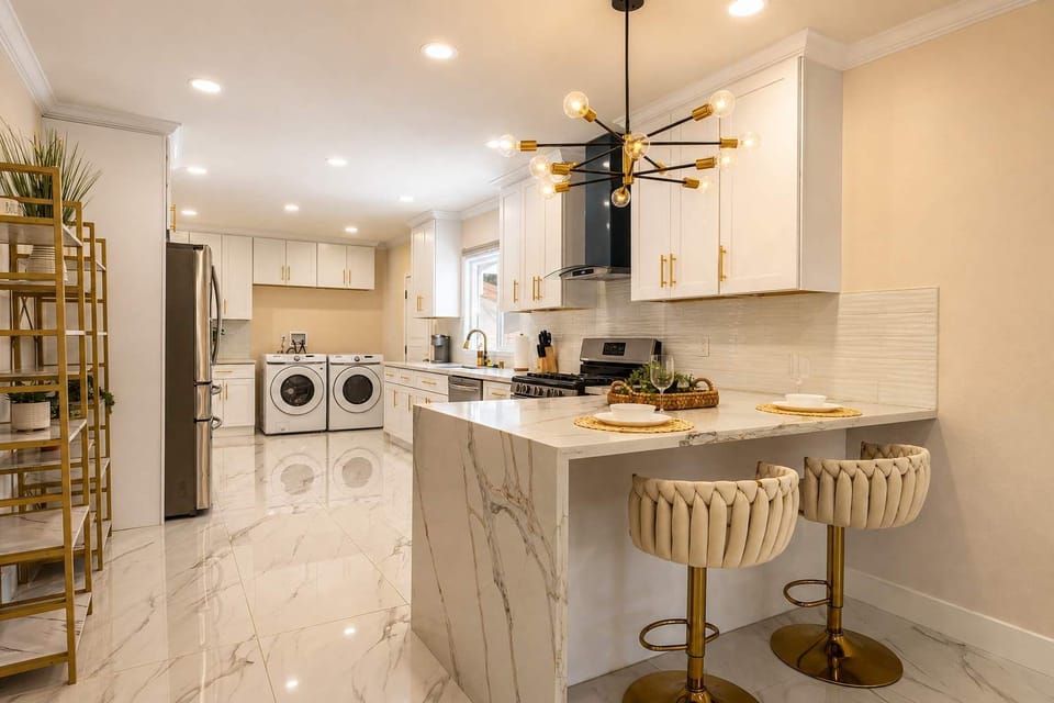 🍽️ Sleek marble kitchen island with bar seating—casual mornings or late-night conversations, either way it's the heart of the home.