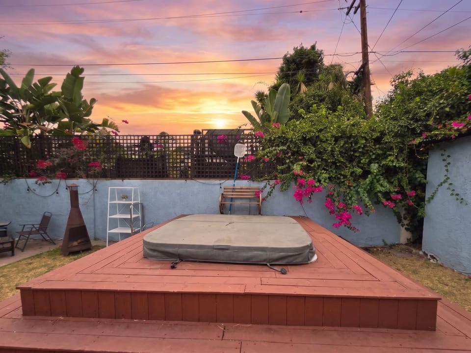 Private hot tub with sunset views🌅 —soak in the warmth as the sky turns gold above the patio.