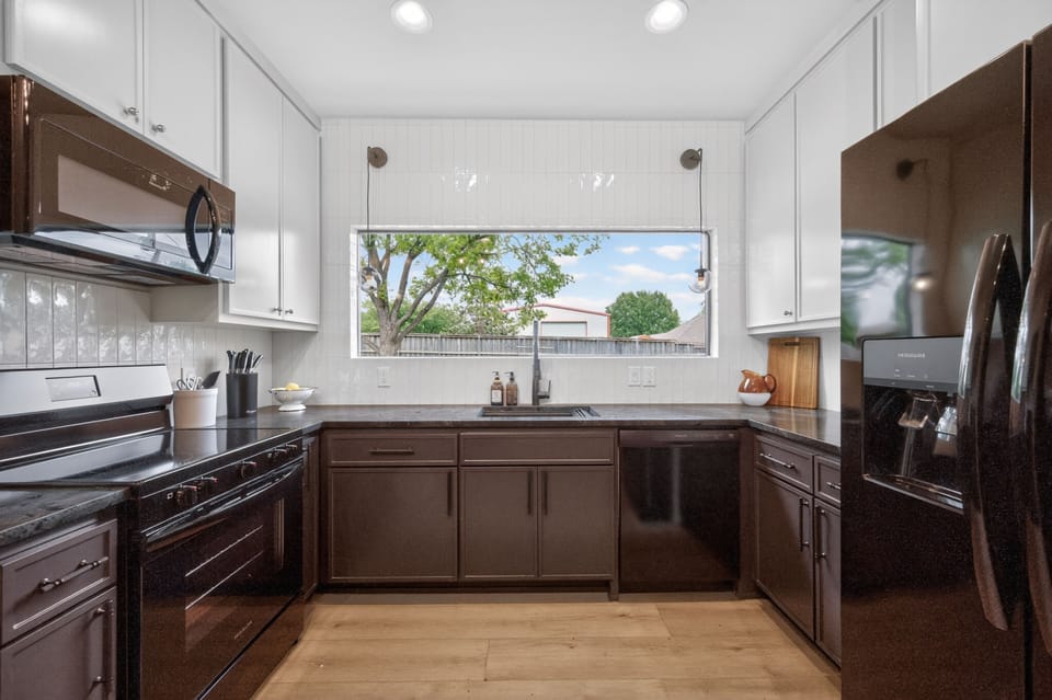 The bunkhouse features its own fully equipped kitchen with full-size appliances, cookware, and everything needed for preparing meals.