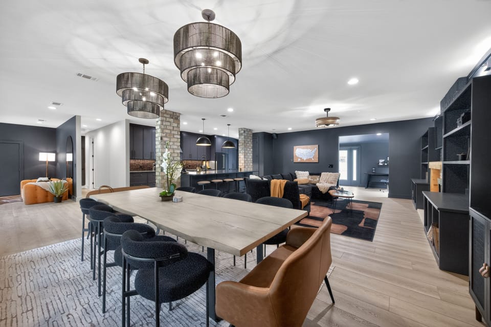 The 10-foot dining table comfortably seats 12, creating the perfect place for family dinners, holiday meals, celebrations, and late-night conversations.