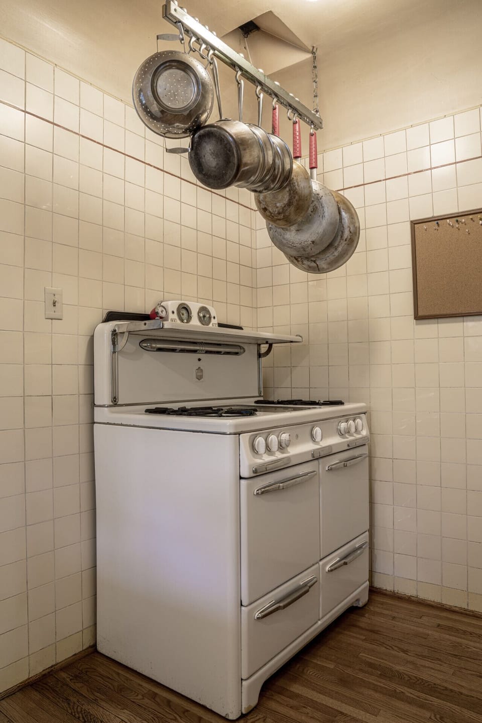 A charming vintage stove that adds personality to the kitchen — fully functional and a nod to the home`s Silver Lake character.