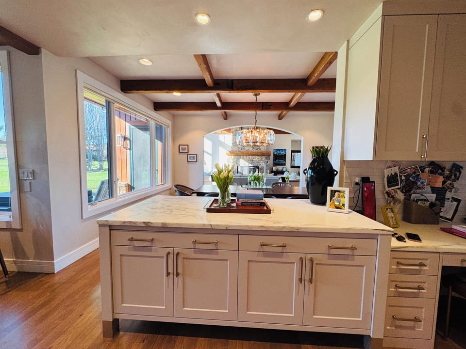 open living space- but still formal space, too.  kitchen desk w charge station