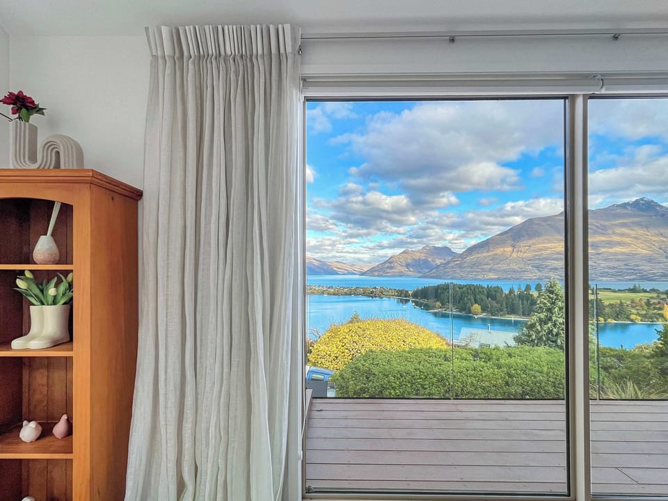 Large windows with mountain views