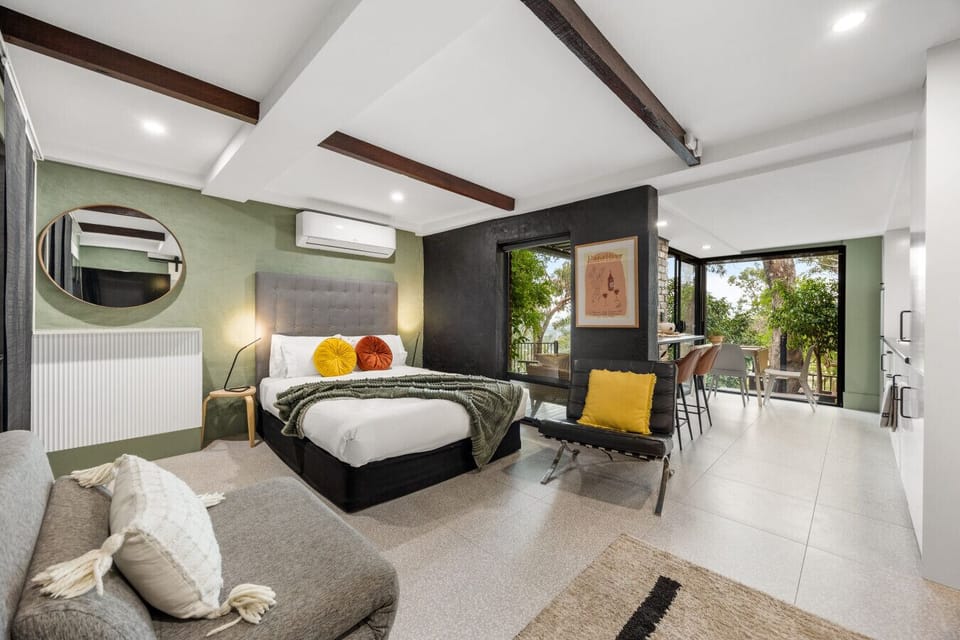 The sleeping area is a stylish, spacious retreat with a thoughtful design for a restful night’s sleep.