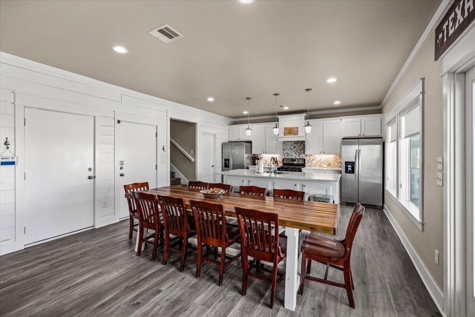 Bright open-concept kitchen and living area with modern finishes in Crystal Beach Port Bolivar home