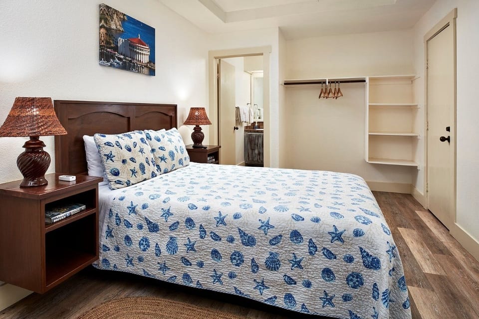 Recharge in a calm bedroom with lamps and easy storage.