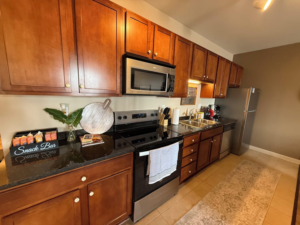Pull up a stool and enjoy the heart of the home—perfect for quick breakfasts, casual drinks, or keeping the chef company while something delicious is cooking.