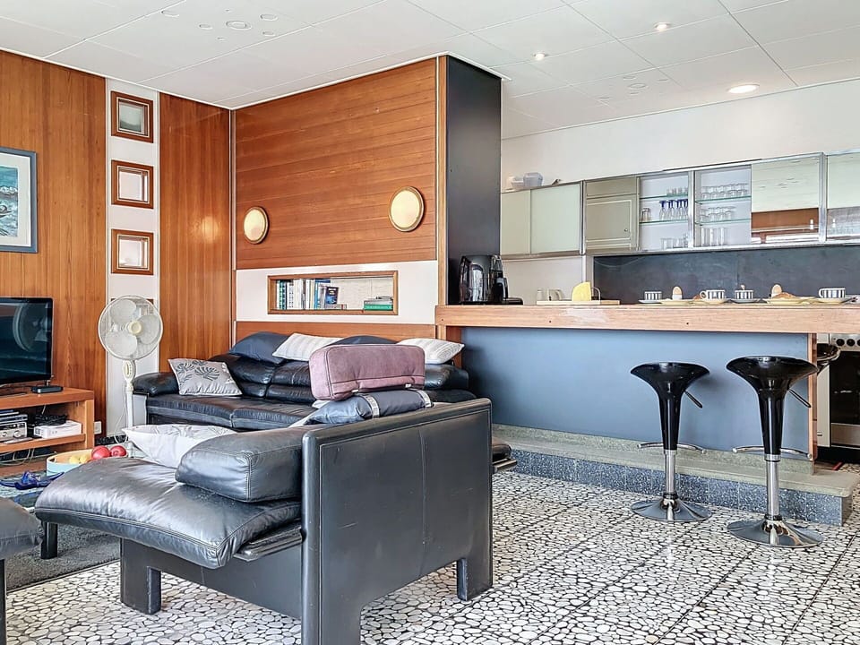 Furniture, Interior Design, Flooring, Floor, Wood, Ceiling, Room, Chair, Lighting, Table