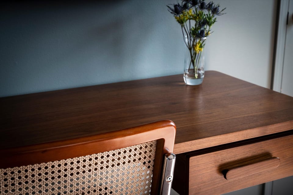 Desk space in the bedroom—ideal for a quick email or mapping out the day.
