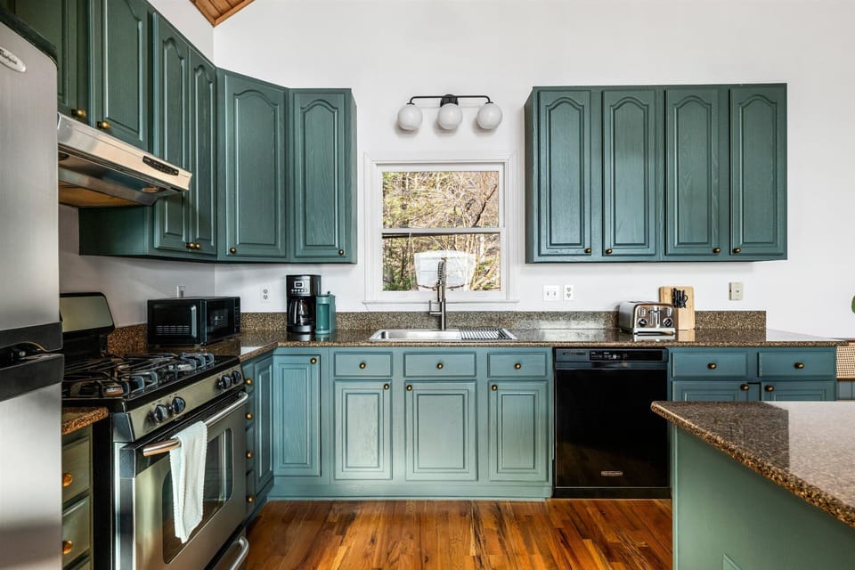 A well-stocked kitchen with island seating and coffee bar—everything you need for easy meals and slow mornings.