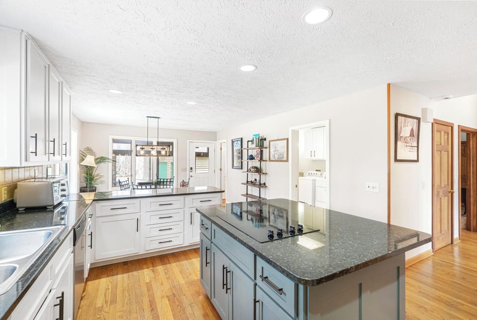 Kitchen---Granite Counter-tops, Stainless Steel, Open to Breakfast Nook