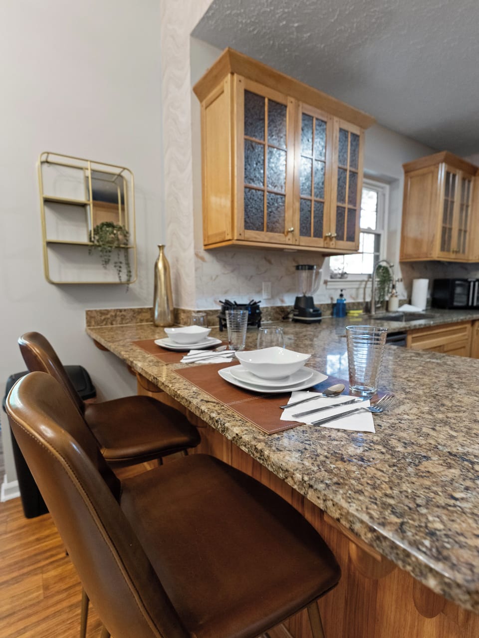 Bar seating in the kitchen makes for memorable pancake mornings + easy evenings
